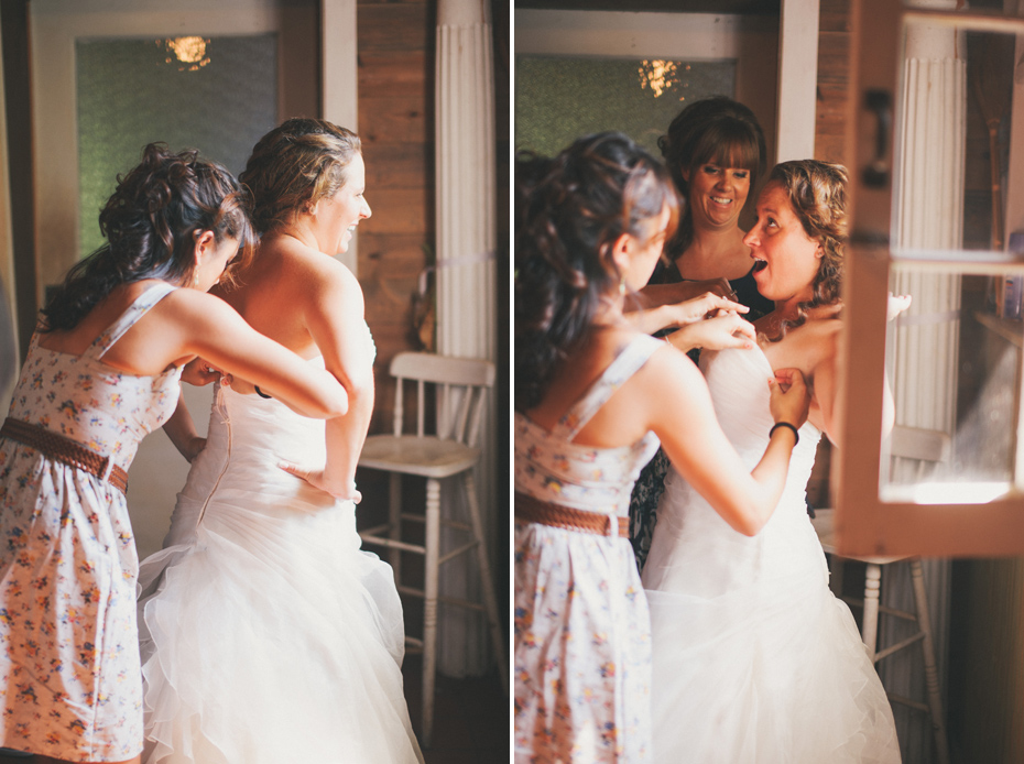 A bride gets ready at the Blue Dress Barn in Benton Harbor Michigan, shot by wedding Photographer Heather Jowett.