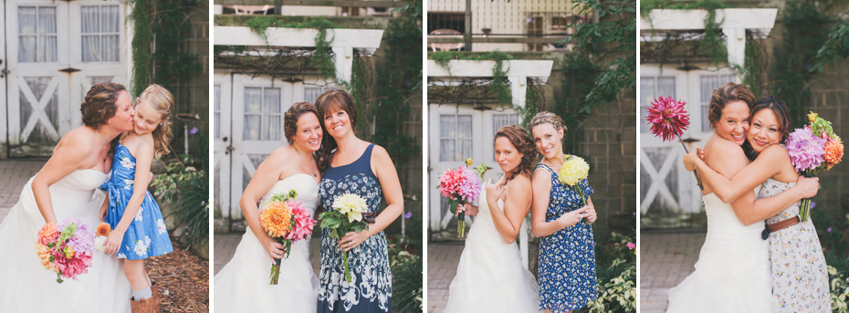 Bridesmaids in Floral Dresses and cowboy boots photographed by Ann Arbor Michigan wedding photographer Heather Jowett at the Blue Dress Barn in Benton Harbor.