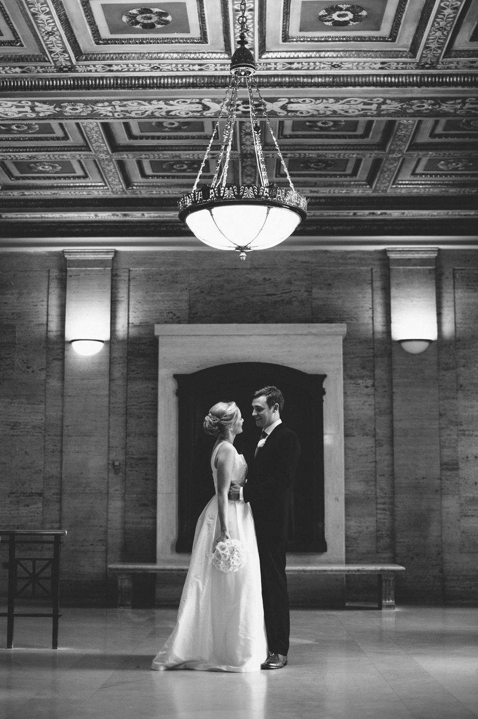 A bride and groom portrait at Angell Hall in Ann Arbor, shot by wedding photographer Heather Jowett