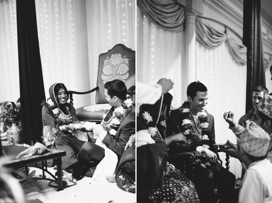 The bride and groom are blessed by family members during a traditional Nepali Hindu wedding ceremony.