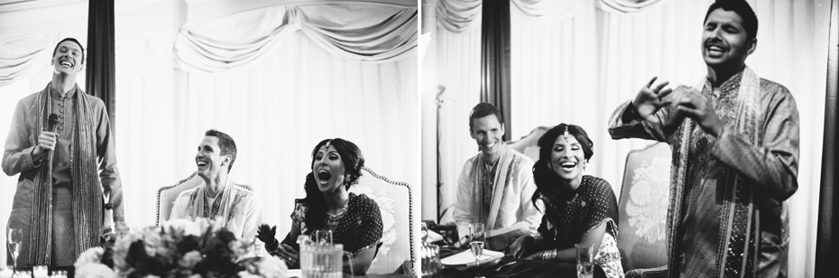 The bride and groom laugh at toasts at a hindu wedding reception, by Ann Arbor wedding photographer Heather Jowett.