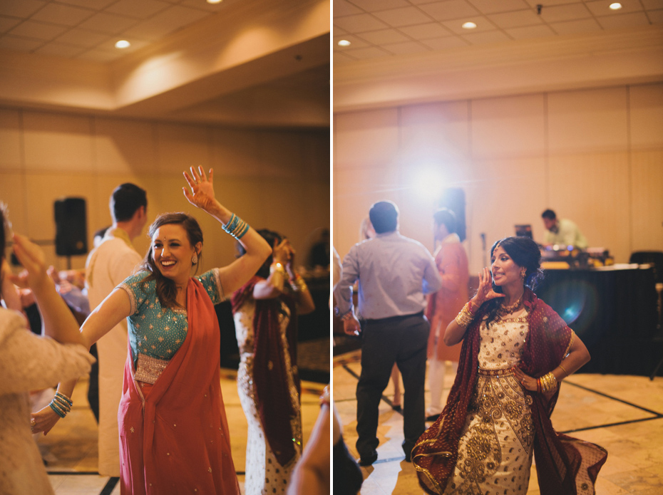 Guests dance at a hindu wedding reception, by Ann Arbor wedding photographer Heather Jowett.