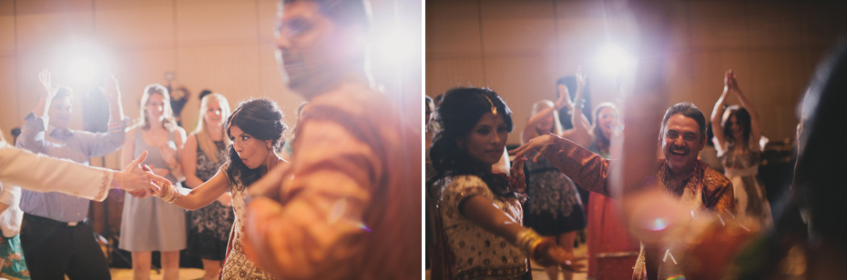 Guests dance at a hindu wedding reception, by Ann Arbor wedding photographer Heather Jowett.