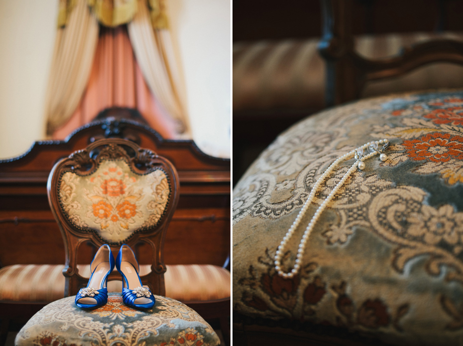 A bride's blue shoes and pearl necklace at the Fountainview mansion, photographed by Ann Arbor Wedding Photographer Heather Jowett.