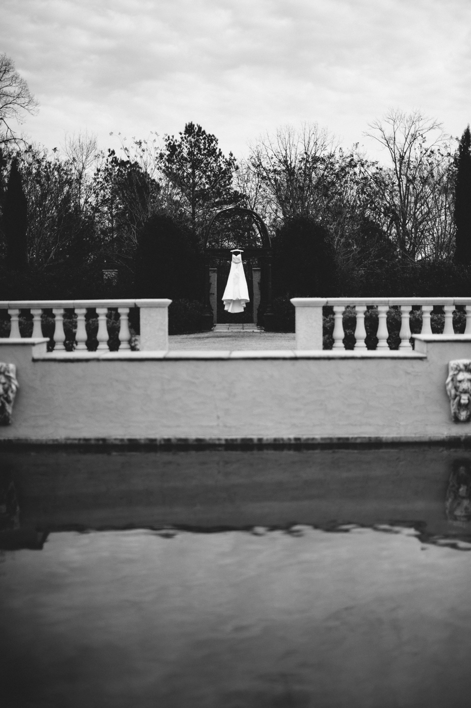 A bride's dress hangs at the Fountainview mansion, photographed by Ann Arbor Wedding Photographer Heather Jowett.