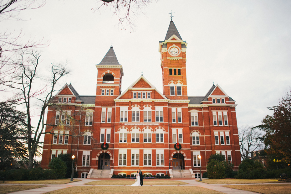 A bride and groom pose outside of Samford Hall in Auburn Alabama, photographed by Ann Arbor Wedding Photographer Heather Jowett.