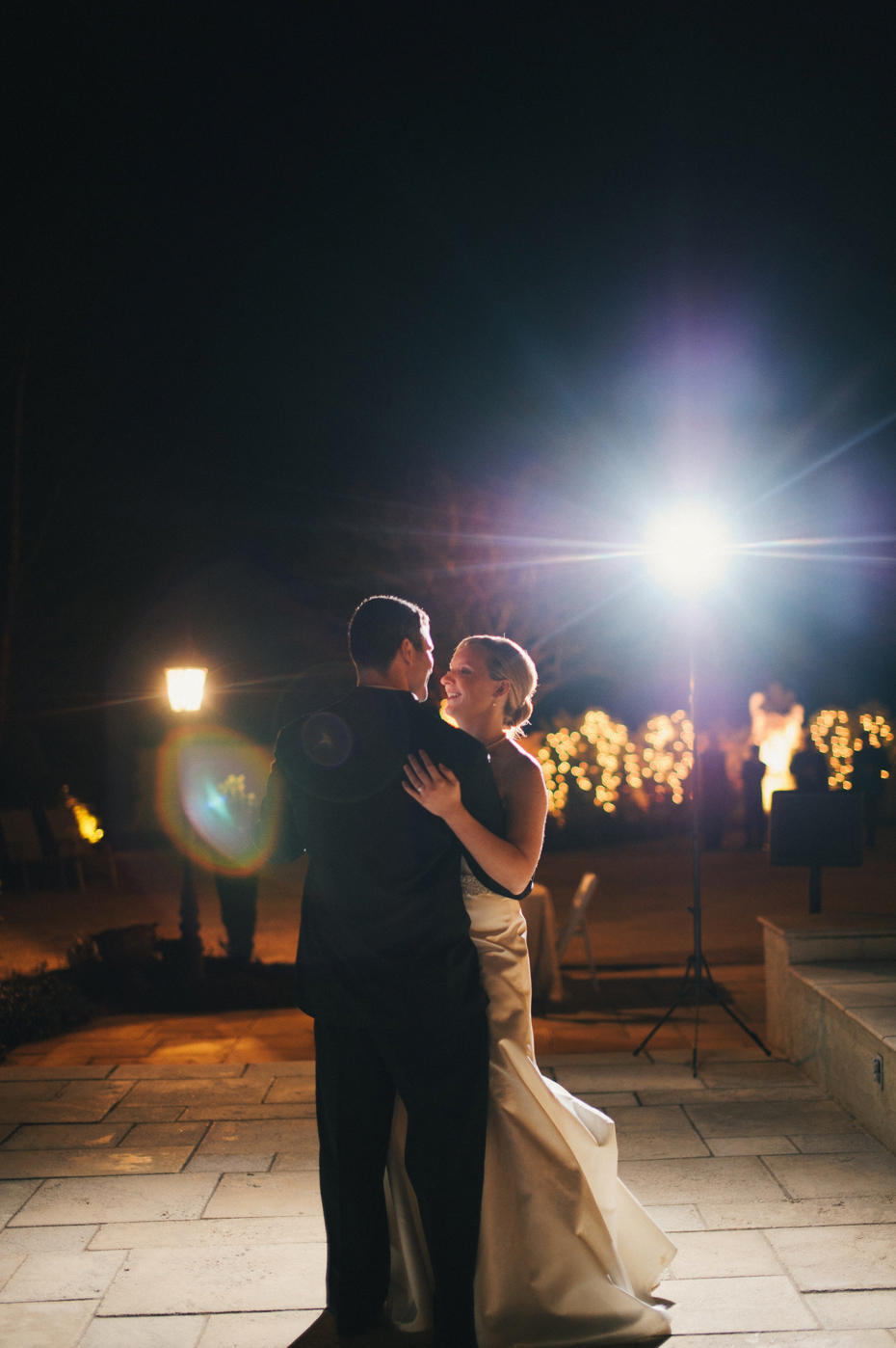 Bride and groom share a first dance at their wedding reception at The Fountainview Mansion in Auburn Alabama, photographed by Ann Arbor Wedding Photographer Heather Jowett.