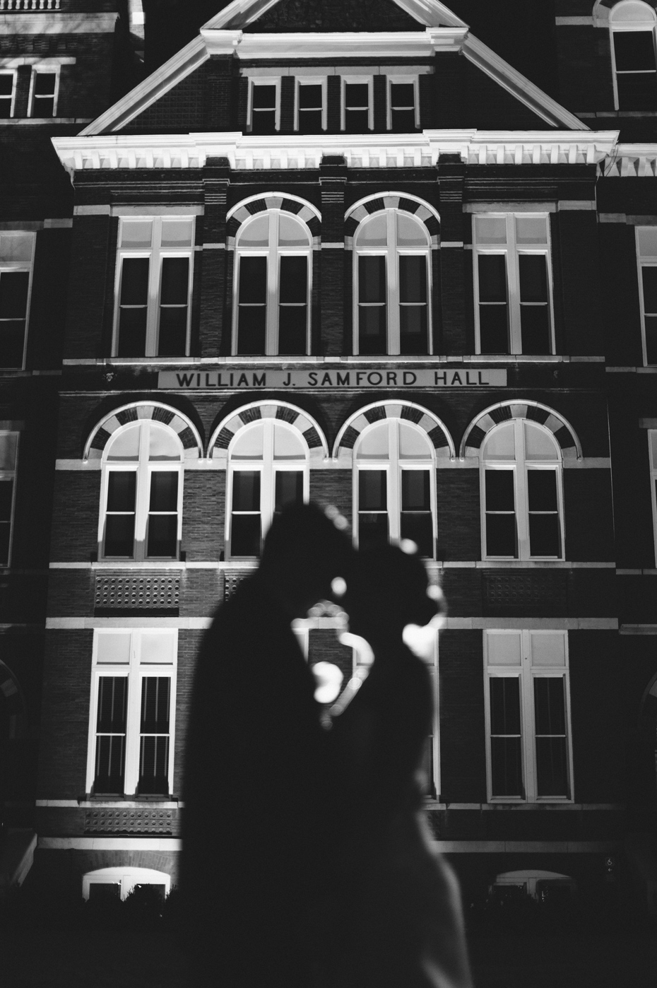 The bride and groom share one last portrait in front of Samford Hall in Auburn Alabama, photographed by Ann Arbor Wedding Photographer Heather Jowett.