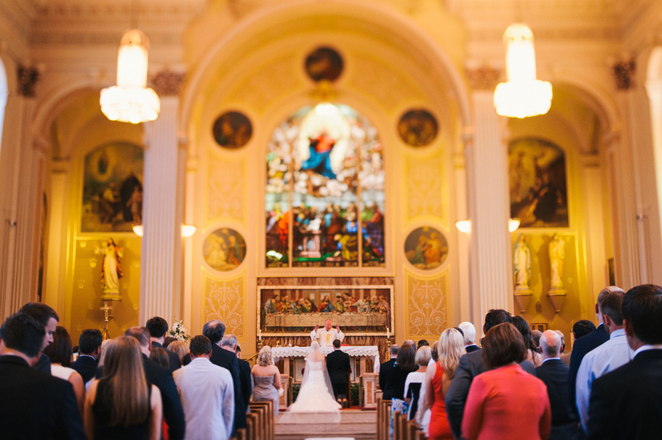 Tilt shift photography during a catholic wedding mass, photographed by Ann Arbor Wedding Photographer, Heather Jowett