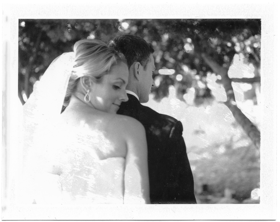 Bride and groom polaroid portraits at the Lincoln Park Zoo, by Michigan Wedding Photographer, Heather Jowett on a vintage polaroid land camera.