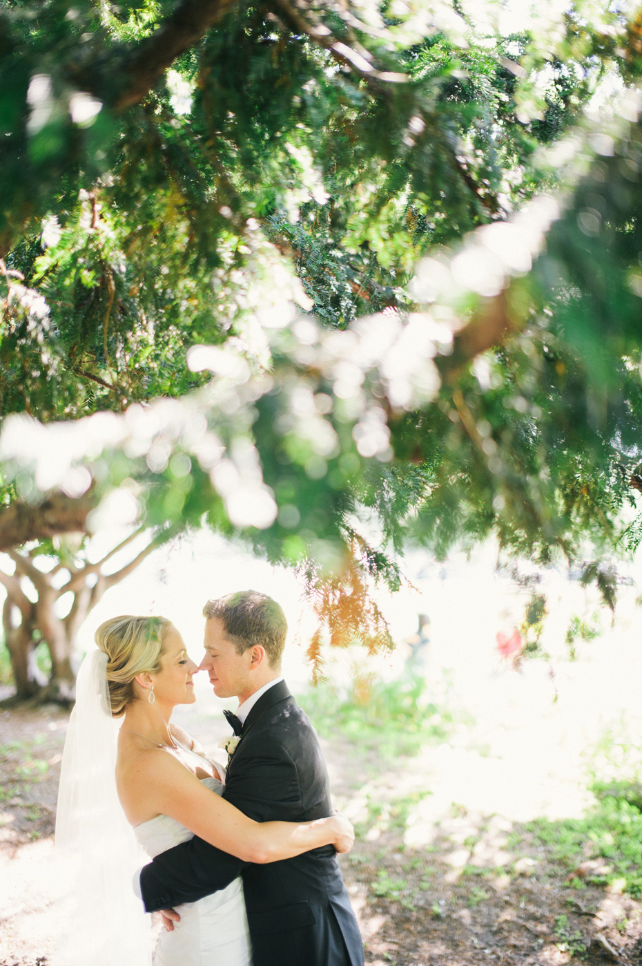 Bride and groom portraits at the Lincoln Park Zoo, by Michigan Wedding Photographer, Heather Jowett