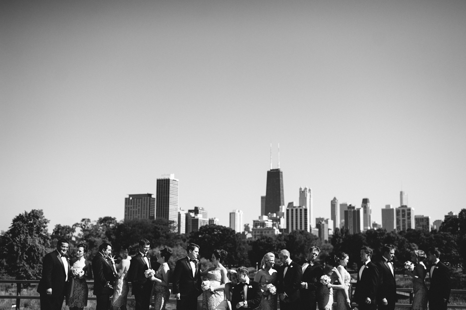 Wedding party portraits at the Lincoln Park Zoo with a view of the Chicago Skyline, by Michigan Wedding Photographer, Heather Jowett