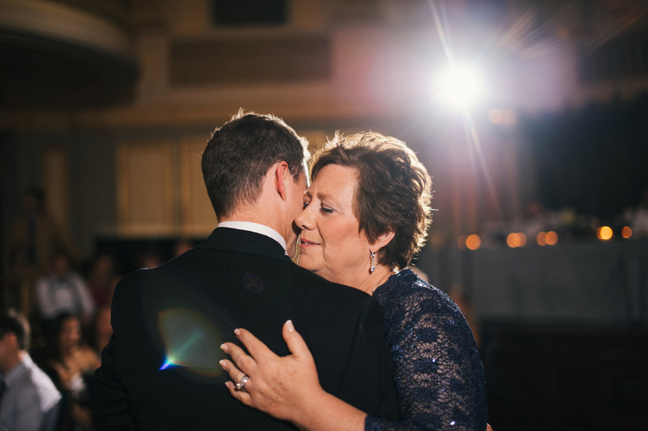 The groom shares a dance with his mother at a wedding reception at The Murphy Building in Chicago, by Michigan Wedding Photographer, Heather Jowett
