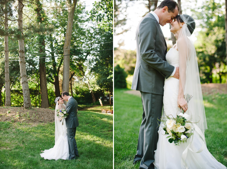 Bride and groom share a quiet moment together after their backyard wedding ceremony by Detroit Michigan wedding photographer, Heather Jowett.