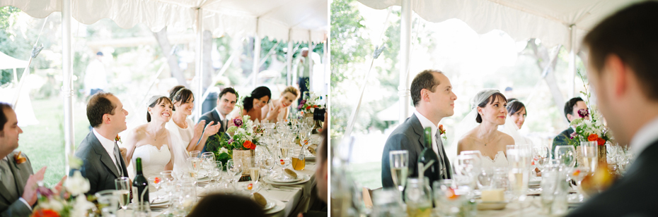 Bride and groom react to the father of the bride's toast at a backyard wedding reception by Ann Arbor Michigan wedding photographer, Heather Jowett.