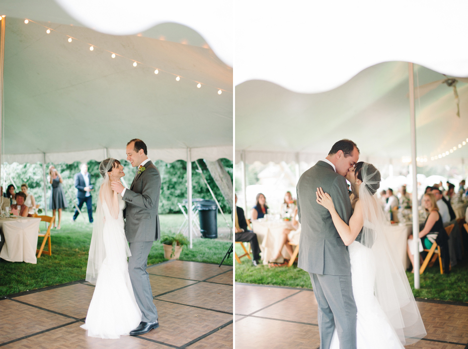 bride and groom share their first dance at their backyard wedding reception by Ann Arbor Michigan wedding photographer, Heather Jowett.