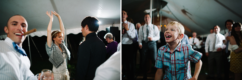 Guests dance in a tent under the stars at a Michigan wedding.