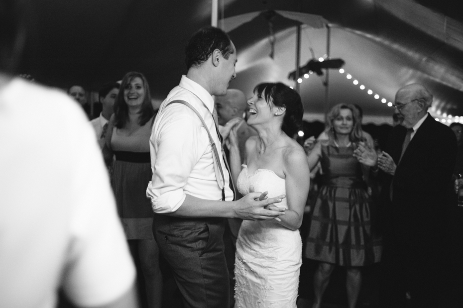 Bride and groom dancing at a backyard wedding by Bloomfield Hills wedding photographer Heather Jowett.