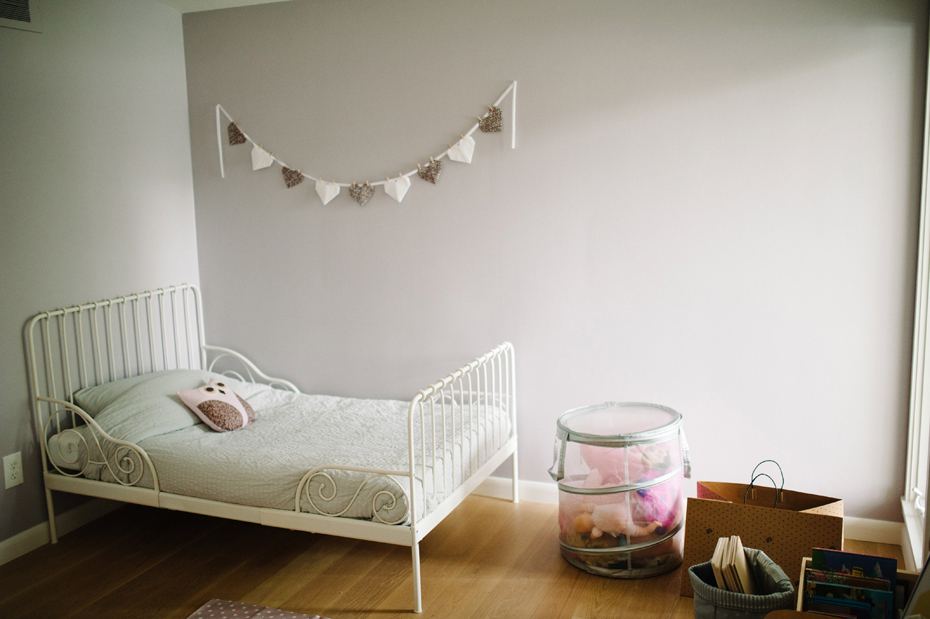 Interior of a child's bedroom in a mid-century home in metro Detroit during a lifestyle family portrait session in Ferndale photographed by Ann Arbor Wedding Photographer, Heather Jowett.