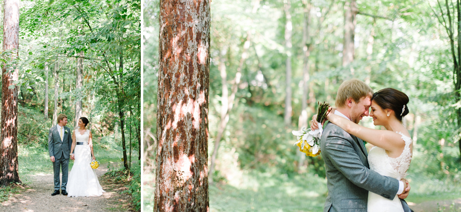 A bride and groom pose amongst trees before their wedding at The Inn at Stonecliffe on Mackinac Island by Michigan Wedding Photographer Heather Jowett.