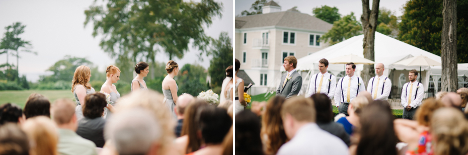 Bridesmaids and groomsmen watch their friends get married during a wedding ceremony held outside at The Inn at Stonecliffe on Mackinac Island by Detroit Wedding Photographer Heather Jowett.