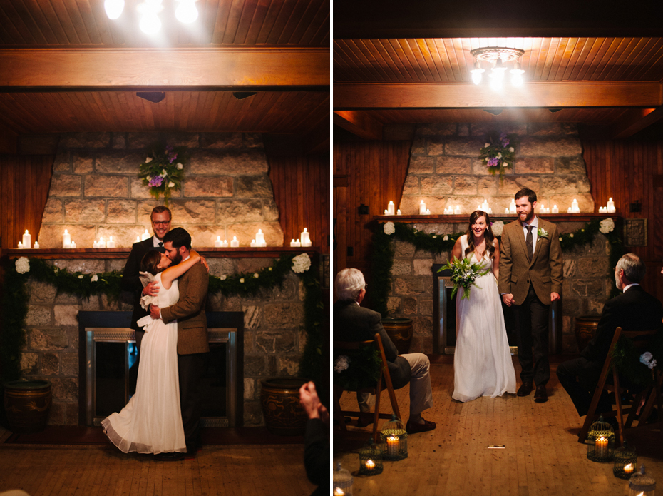 Bride and groom share a first kiss at an intimate candlelit elopement by Ann Arbor Michigan Wedding Photographer Heather Jowett.