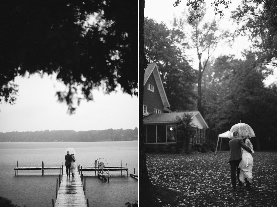 Bride and groom pose for portraits in the rain after their elopement by Ann Arbor Michigan Wedding Photographer Heather Jowett.