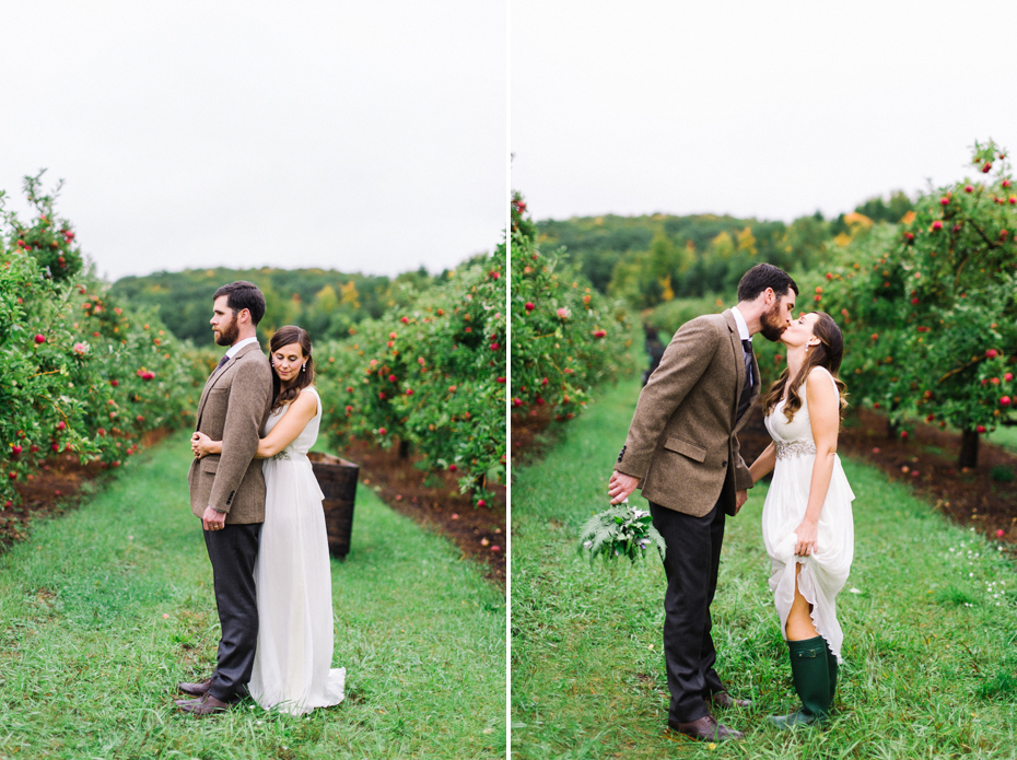 Bride and groom pose for portraits in a beautiful apple orchard after their elopement by Ann Arbor Michigan Wedding Photographer Heather Jowett.