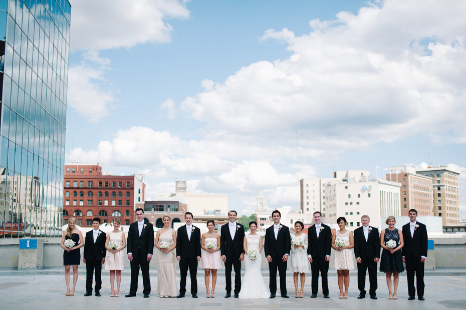 Rooftop wedding photographs with the Gand Rapids Skyline in Michigan