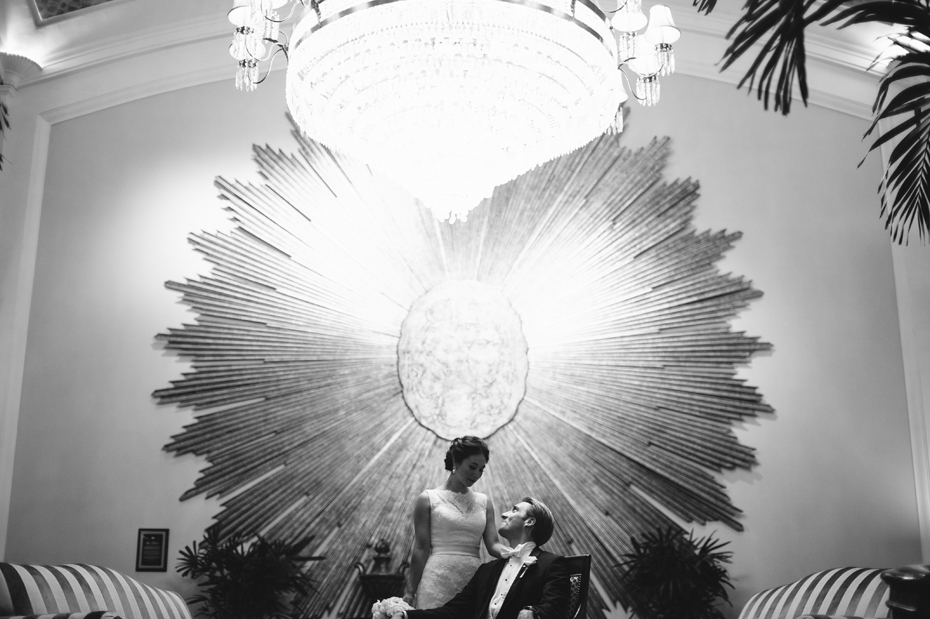 Bride and groom portrait in the lobby of the Amway Grand Hotel in Grand Rapids by Michigan wedding Photographer Heather Jowett