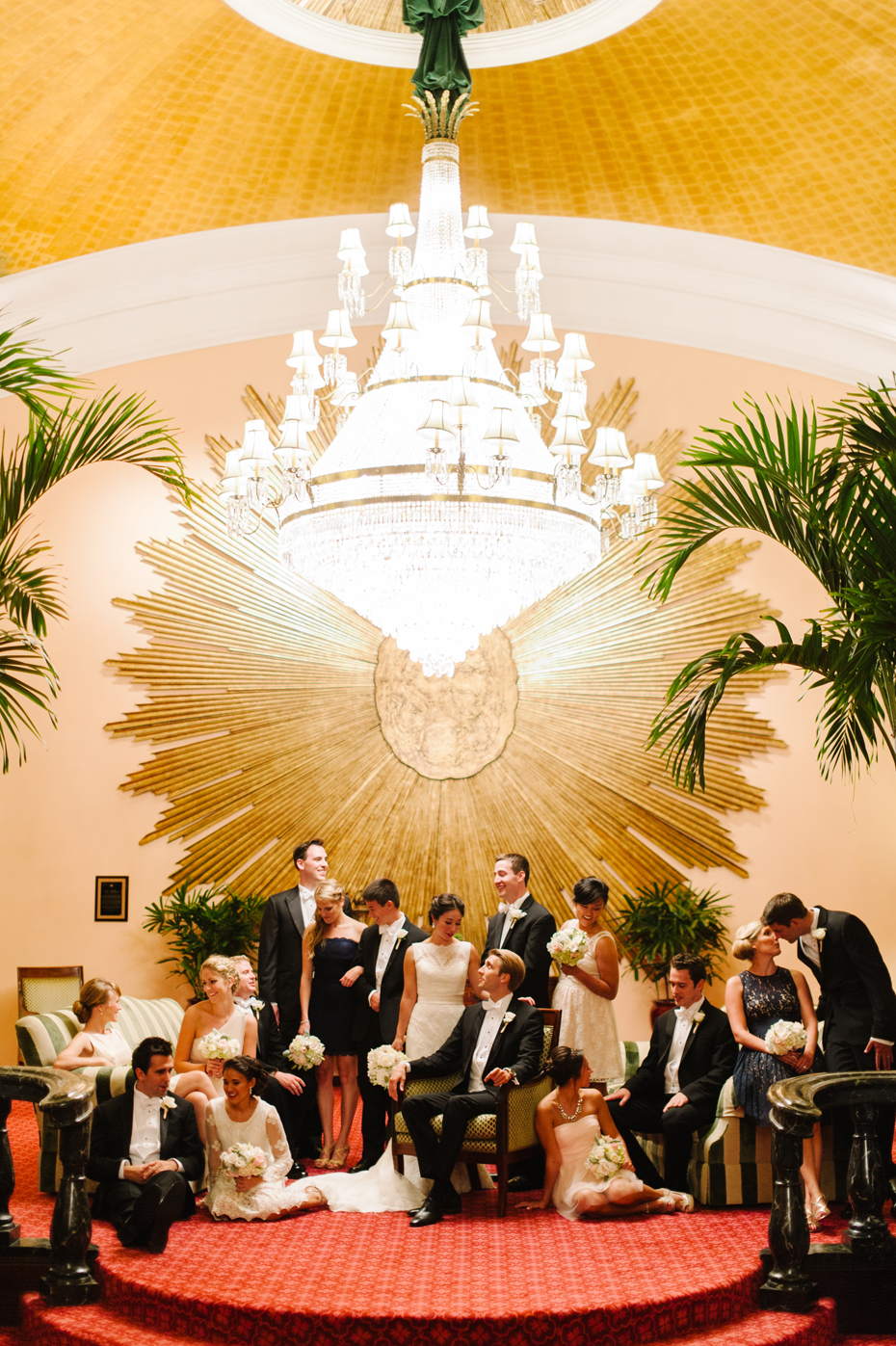 Wedding Party portrait in the lobby of the Amway Grand Hotel in Grand Rapids by Michigan wedding Photographer Heather Jowett