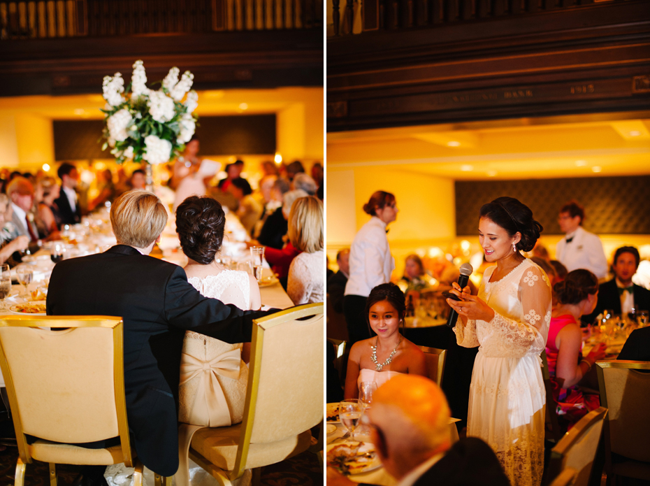 Bride and groom listen to toasts at wedding reception at the Amway Grand Hotel in Grand Rapids Michigan