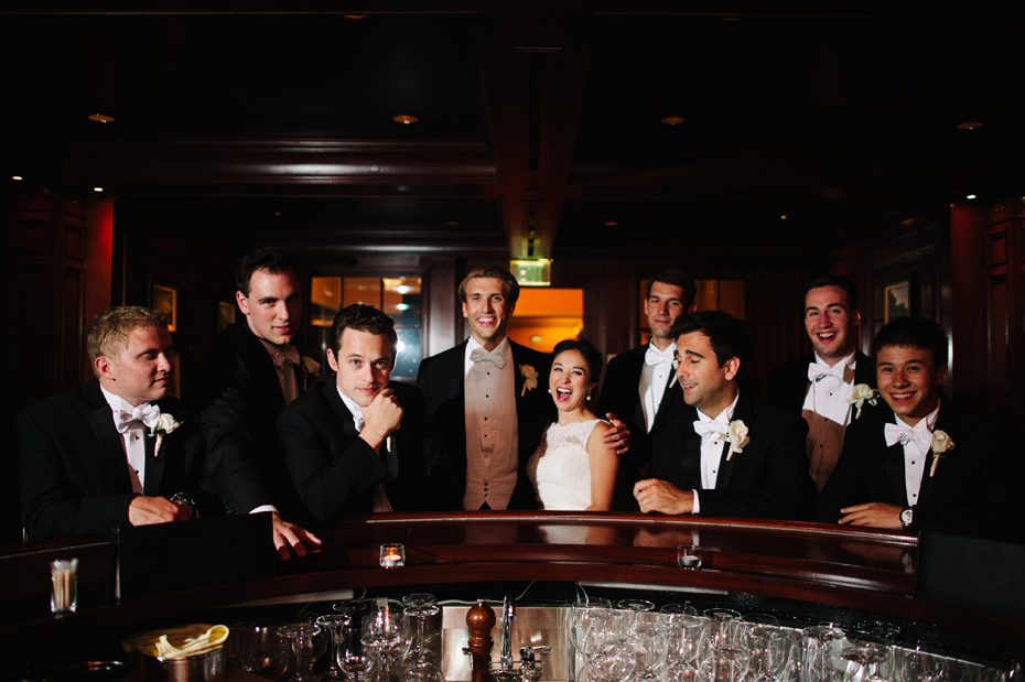 Photograph of groomsmen in bar at Amway Grand in Grand Rapids Michigan