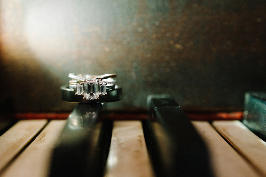 Wedding rings on a piano at Misty Farms.