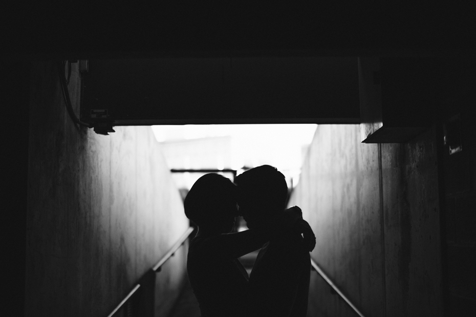 Tigers Baseball fan couple poses for an engagement photo in the tunnel at Comerica Park.