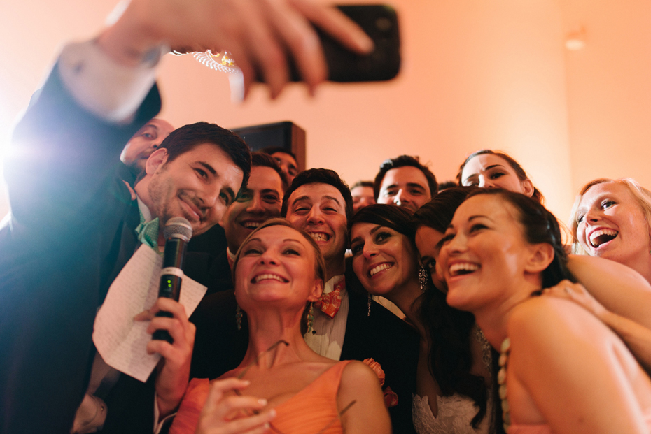 A best man toast is a good time for a selfie at a wedding reception at PFAC, the Peninsula Fine Arts Center in Newport News by Virginia Wedding Photographer, Heather Jowett.