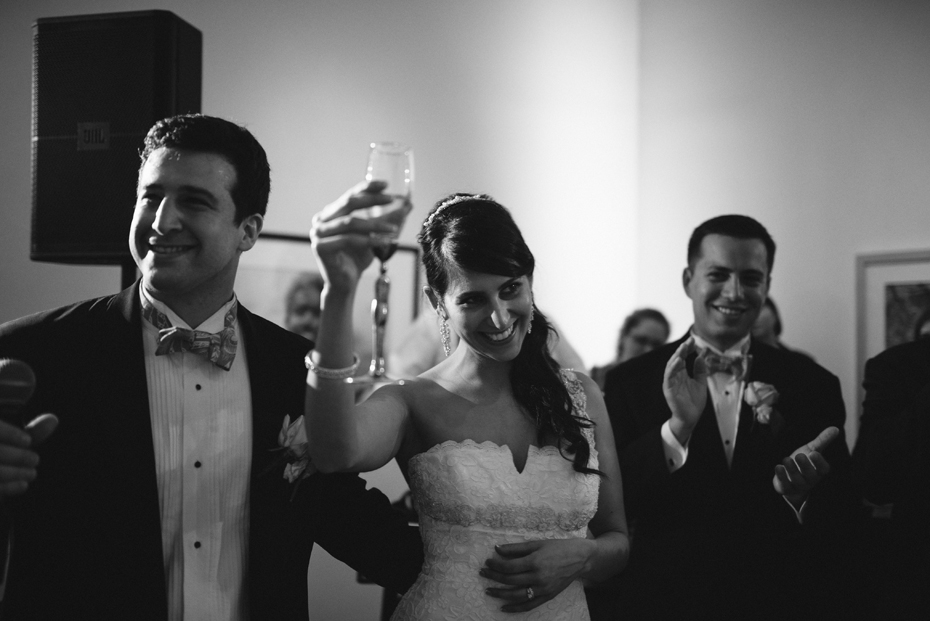 The bride raises her glass at the PFAC.