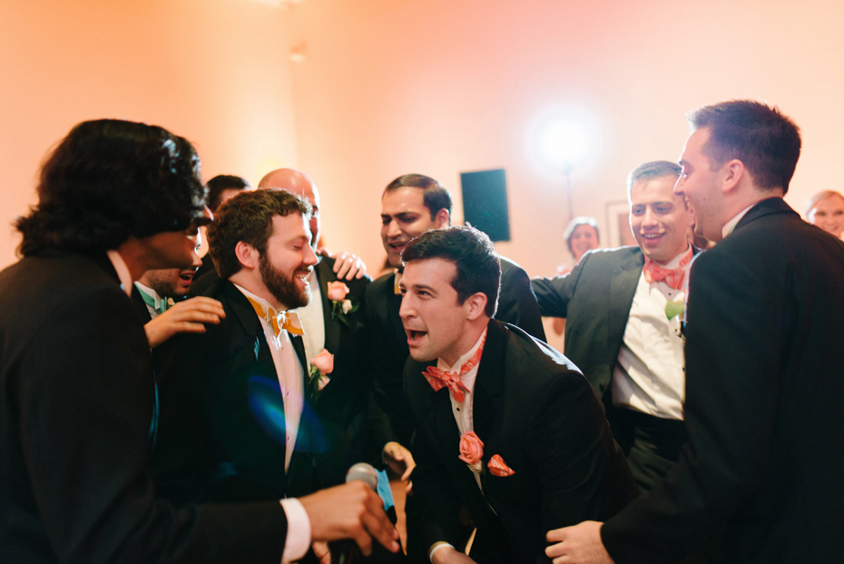 Groomsmen sing and dance at a PFAC wedding reception by Virginia Wedding Photographer, Heather Jowett.