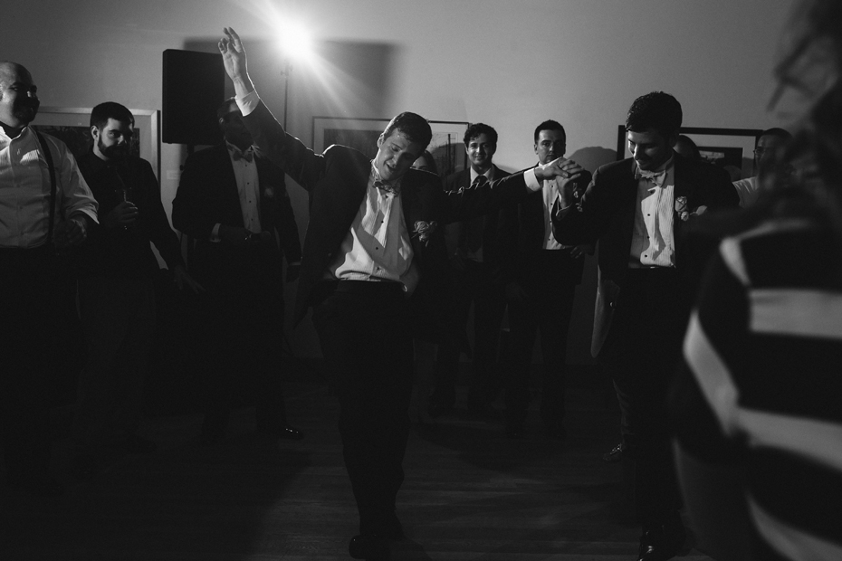 Greek line dancing at a PFAC wedding reception by Virginia Wedding Photographer, Heather Jowett.