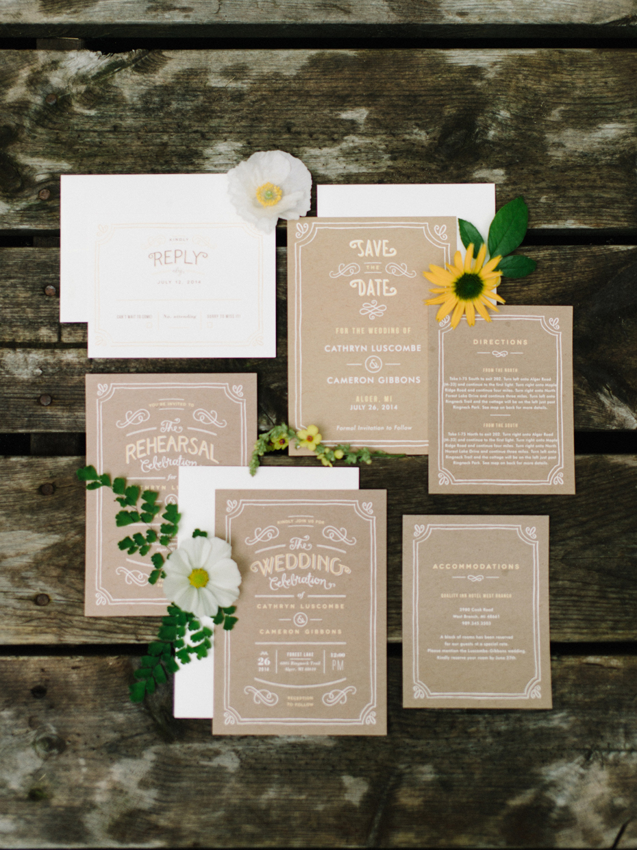 Wedding invitation with krafft paper, yellow, and white for a rustic wedding in Northern Michigan by wedding photographer Heather Jowett.