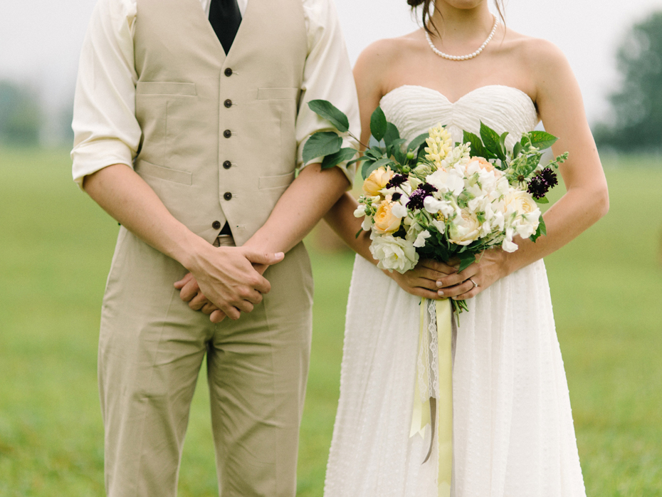 Yellow white khaki rustic wedding bouquet by Katie Wachowiak and photographed by Heather Jowett.