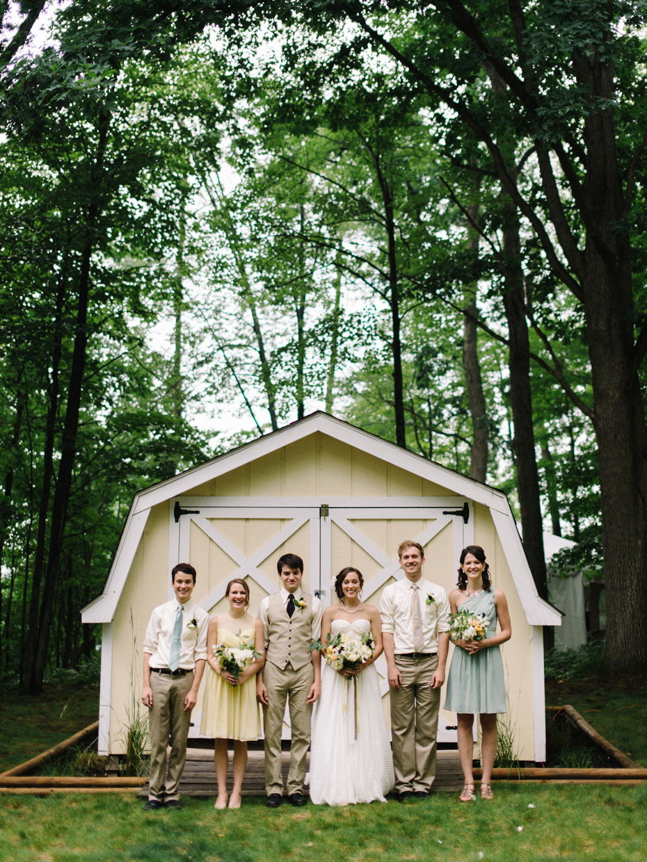 Wedding party in light blue, yellow, and khaki.