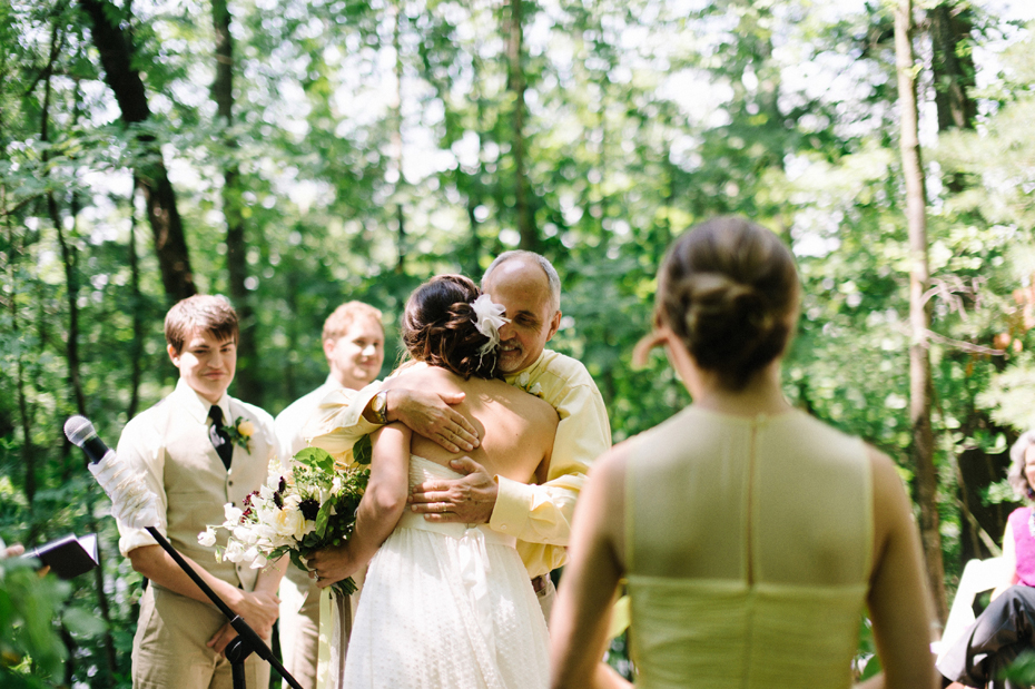 Father giving daughter away at a homespun Northern Michigan Wedding.