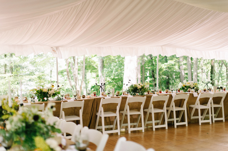 Yellow white burlap rustic wedding flowers and decor by Katie Wachowiak and captured by Wedding Photographer by Heather Jowett at a Northern Michigan wedding.