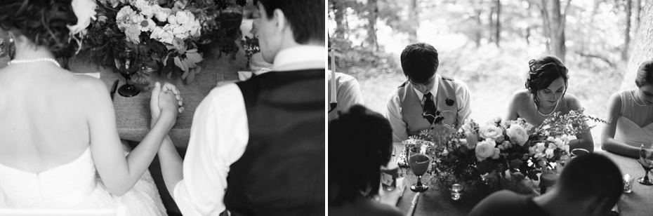 Prayer before dinner at a rustic northern Michigan wedding.