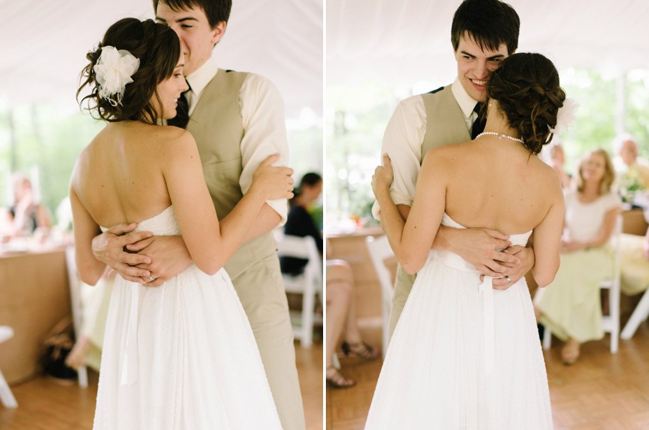 Bride and groom sharing an emotional first dance at their rustic wedding by photojournalistic wedding photographer heather jowett.