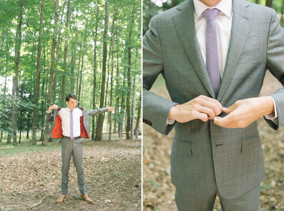 Groom gets dressed in a grey and blue groom's suit for a wedding in Northern Michigan, by Ann Arbor Wedding Photographer Heather Jowett.