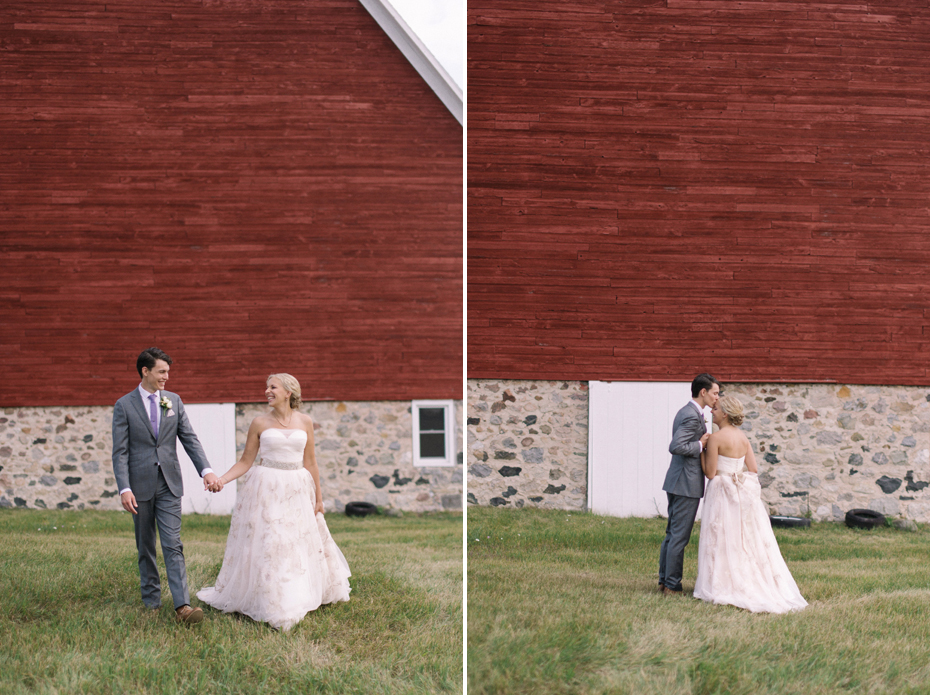 Bride and groom portrait by a red barn.