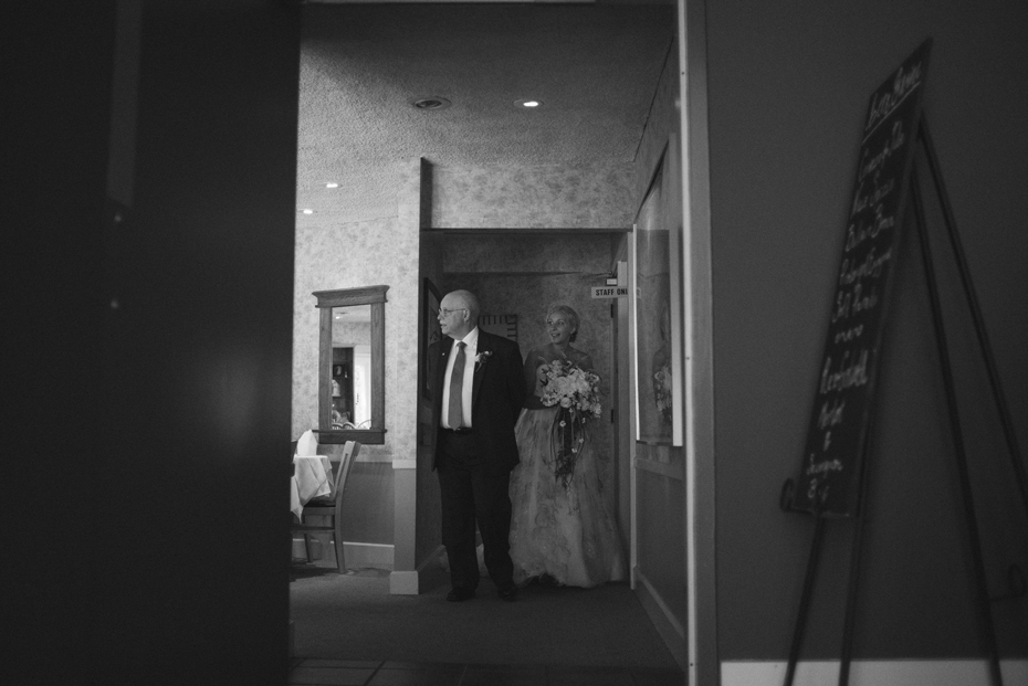 Bride and her father just before walking down the aisle to her wedding ceremony at Tapawingo in Norther Michigan.