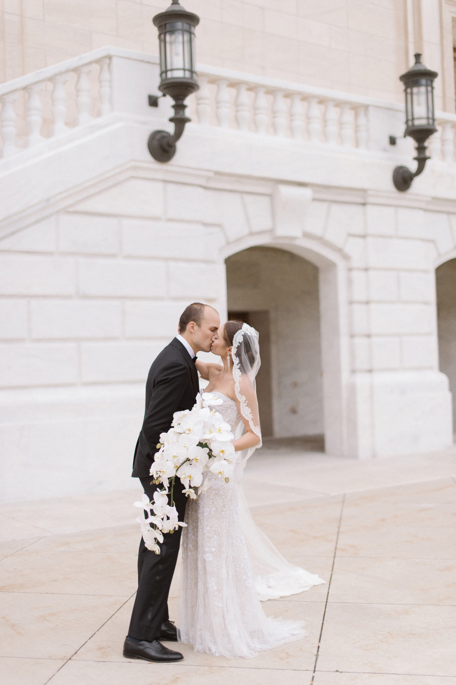 Timeless bride and groom portraits at the Detroit Institute of Arts by Wedding Photographer Heather Jowett.